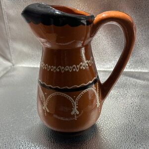 Elegant Ceramic/Terracotta Pitcher with Black & White Accents